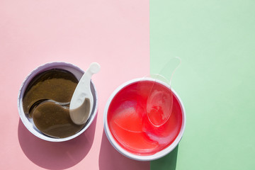 boxes with Patches for eyes and face. Eye pads. collagen for healthy and fresh skin. Skin care concept, anti-aging moisturizing eye mask, hydrogel patches.