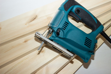 Power tool. Image of electric  fretsaw. Machine saw with a fine blade.