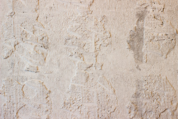 Residues of cement on the concrete wall after removing the tiles. Surface with cement texture for background.