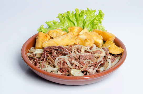 Portion of dried meat with cassava