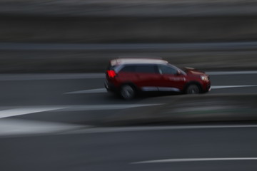 Plakat Driving fast in a highway