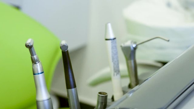 Close-up video of dental instruments and chair in a clinic. The concept of healthcare and treatment in medical institutions