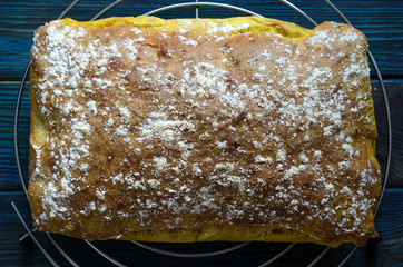 Italian yellow ciabatta bread sliced on a board