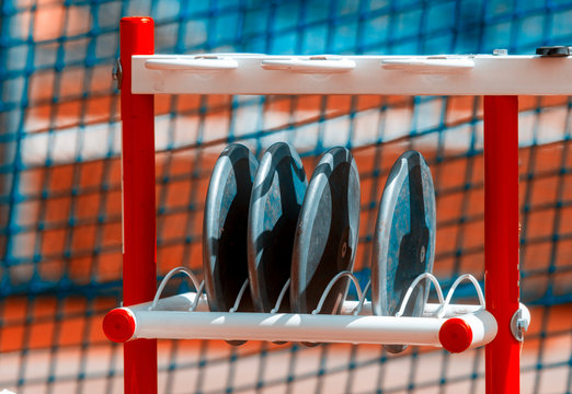 Discus on the track and field stadium. Vintage color filter - Powered by Adobe