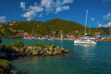 Fototapeta na wymiar A view of yachts moored in a marina in Road Town, Tortola