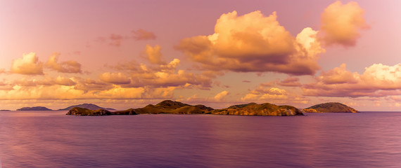 A view of the British Virgin Islands illuminated by the setting sun in Tortola