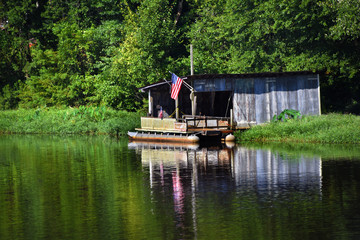 Fototapeta premium Party Barge and Boat House on White Oak Lake