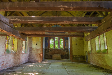 Abandoned, dilapidated and empty church.