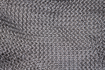 chain mail close up texture background. abstract iron ring backdrop. protection concept
