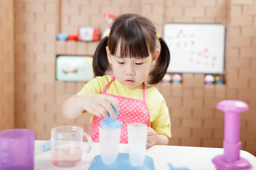 young girl making ice lolly for homeschooling