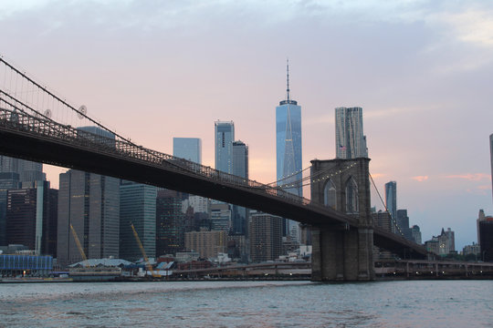 The Brooklyn Bridge in New York at sunset.