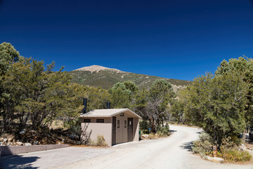 Obraz na płótnie Canvas Sunny view of the toilet of Baker Creek Campground