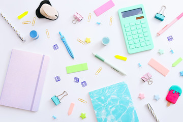 Flat lay of stationery on white background