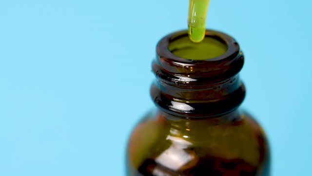 Organic essence. Green essential oil. Skin care and alternative medicine. CBD medical oil. 