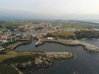 Obraz premium Puerto de Vega, coastal village of Asturias.Spain. Aerial Drone Photo