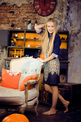 Fototapeta premium young pretty teenage girl in halloween holiday decorated interior happy smiling, lifestyle people concept