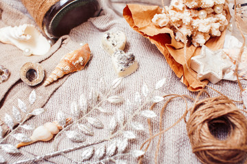 Fototapeta a lot of sea theme in mess like shells, candles, perfume, girl stuff on linen, pretty textured post card view vintage obraz