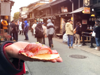 Japanese street food close-up Hida Beef Sushi and cracker at Takayama, Japan