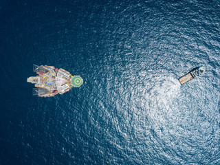 Aerial view offshore jack up rig at the offshore location, view from a drone