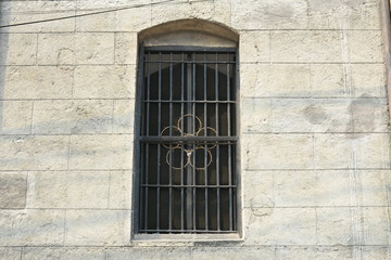 Window with metal grill installed during Spanish era