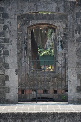 Window with metal grill installed during Spanish era