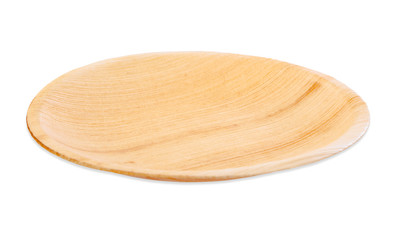 Plate made from dried betel nut leaf palm, natural material isolated on white background.