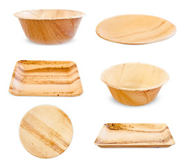 Set of plate anc cup made from dried betel nut leaf palm, natural material isolated on white background.