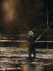 man fishing in the river