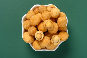 top view tasty peanuts snack on a small dish