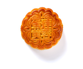 translation of the Chinese to English-lotus seed paste with yolk-top view traditional mooncake on...