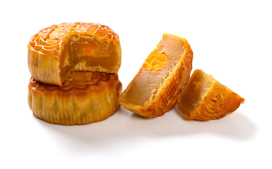 translation of the Chinese on top to English-lotus seed paste with yolk traditional mooncake sections on white no logo or trademark