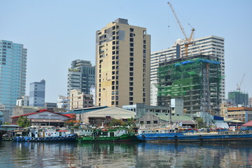 Neighboring buildings cityscape at Pasig river in Manila, Philippines