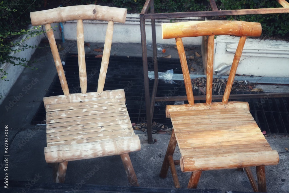 Wall mural wooden chair in the garden