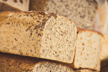 Fresh loaves of rye or wheat bread. Vintage photo