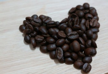 coffee beans on a wooden background