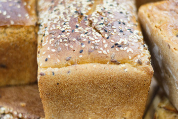 Fresh traditional loaves of rye or wheat bread