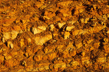 Rocky mountain slope at sunset.