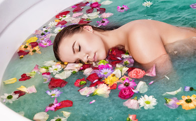 Young beautiful woman relaxes spa procerure