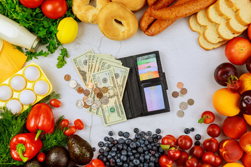 Purchasing healthy food with cash or credit card.