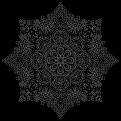 White outline mandala on a black doodles sketch