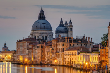Fototapeta na wymiar The Basilica Di Santa Maria Della Salute and the Canale Grande in Venice before sunrise