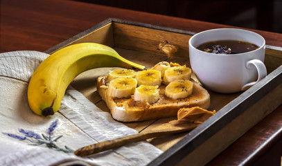 breakfast tray with a serviette and breakfast