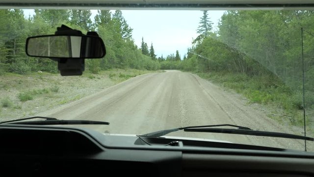 Interior RV Driving POV Dirt Road Highway Mountains Yukon Territory Canada