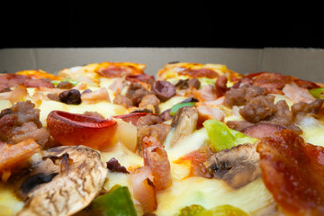 Macro view of takeaway pizza,