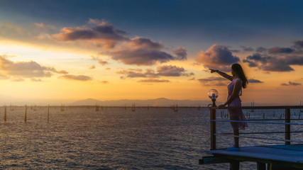 Obraz premium Panorama traveler woman joy fun beautiful nature scenic landscape Songkhla lake at sunset, Panoramic view tourist travel Thailand summer vacation trips, Tourism destinations place Asia for web banner