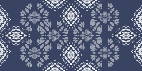 White ornate on blue luxury background. Damask style vector pattern. Renaissance surface design