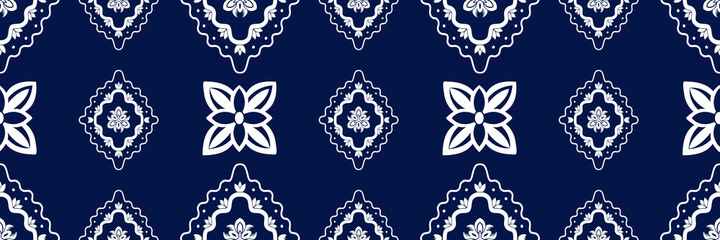 White ornate on blue luxury background. Damask style vector pattern. Renaissance surface design