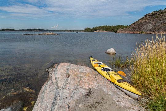 Kayak Resting on Rocky Shore in Swedish Archipelago