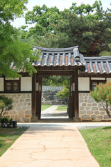 Obraz premium Traditional Korean hanok the entrance and Stone wall.