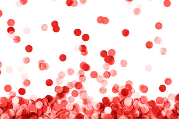 Festive red confetti background. Flat lay style.